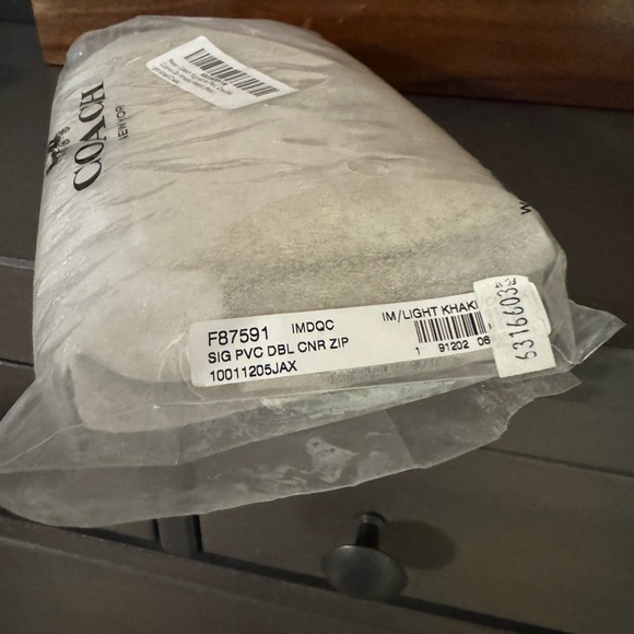 Coach Signature Beige Wristlet - Picture 6 of 7